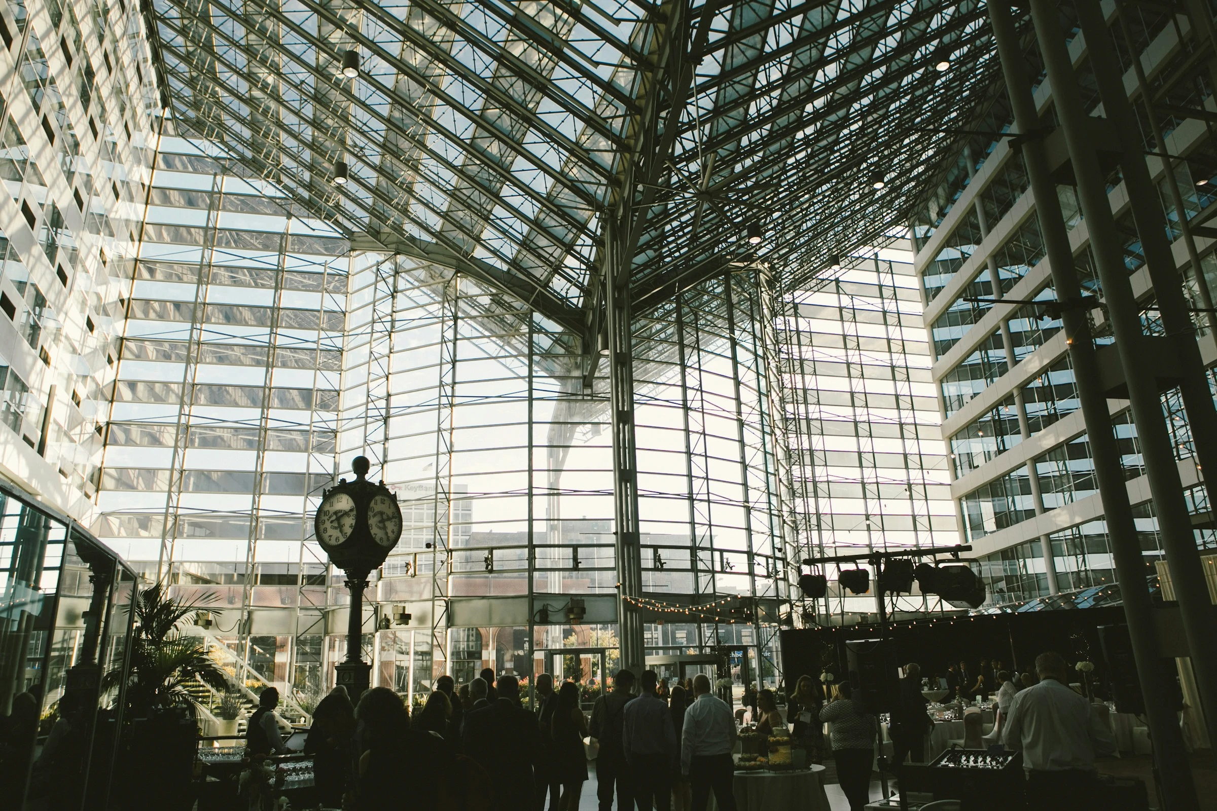 People gathering in a light-filled space